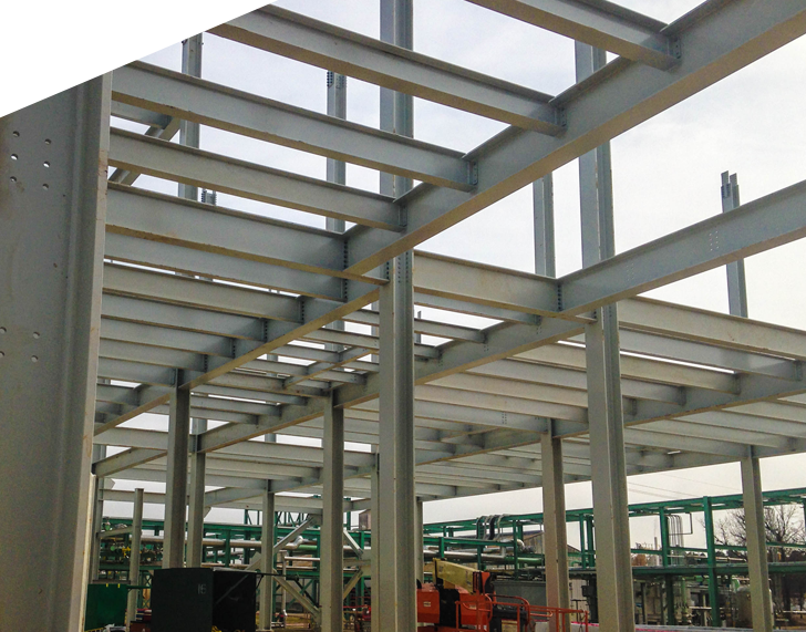 Erected structural steel on an industrial construction site.
