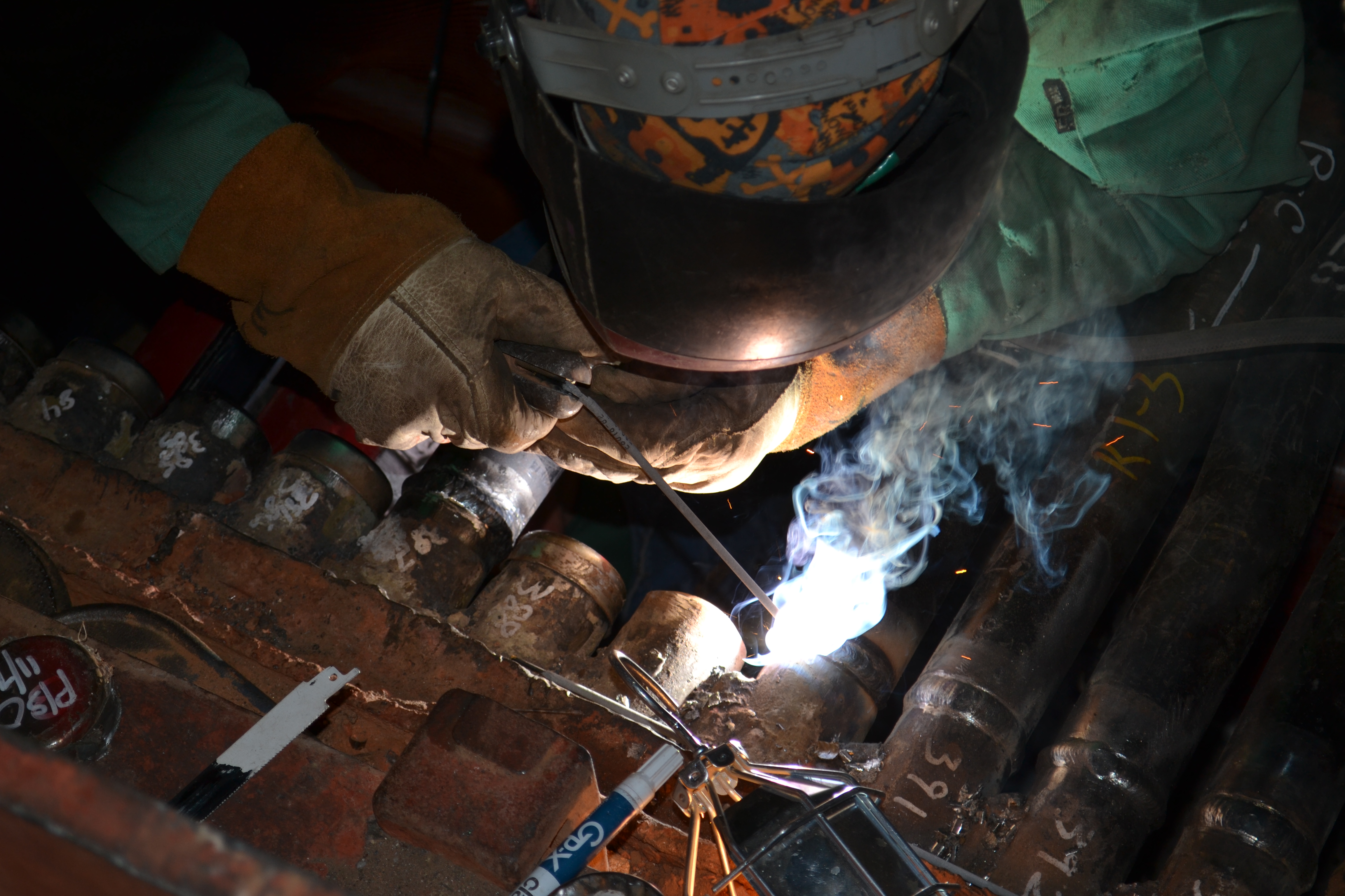 Boilermaker welding during a shutdown, turnaround, or outage.