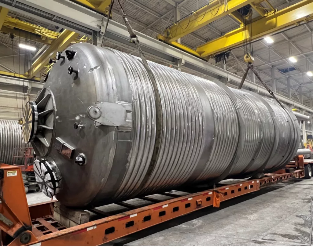 A 2205 duplex bio-reactor with 316L SS half-pipe jacket in a fabrication shop.