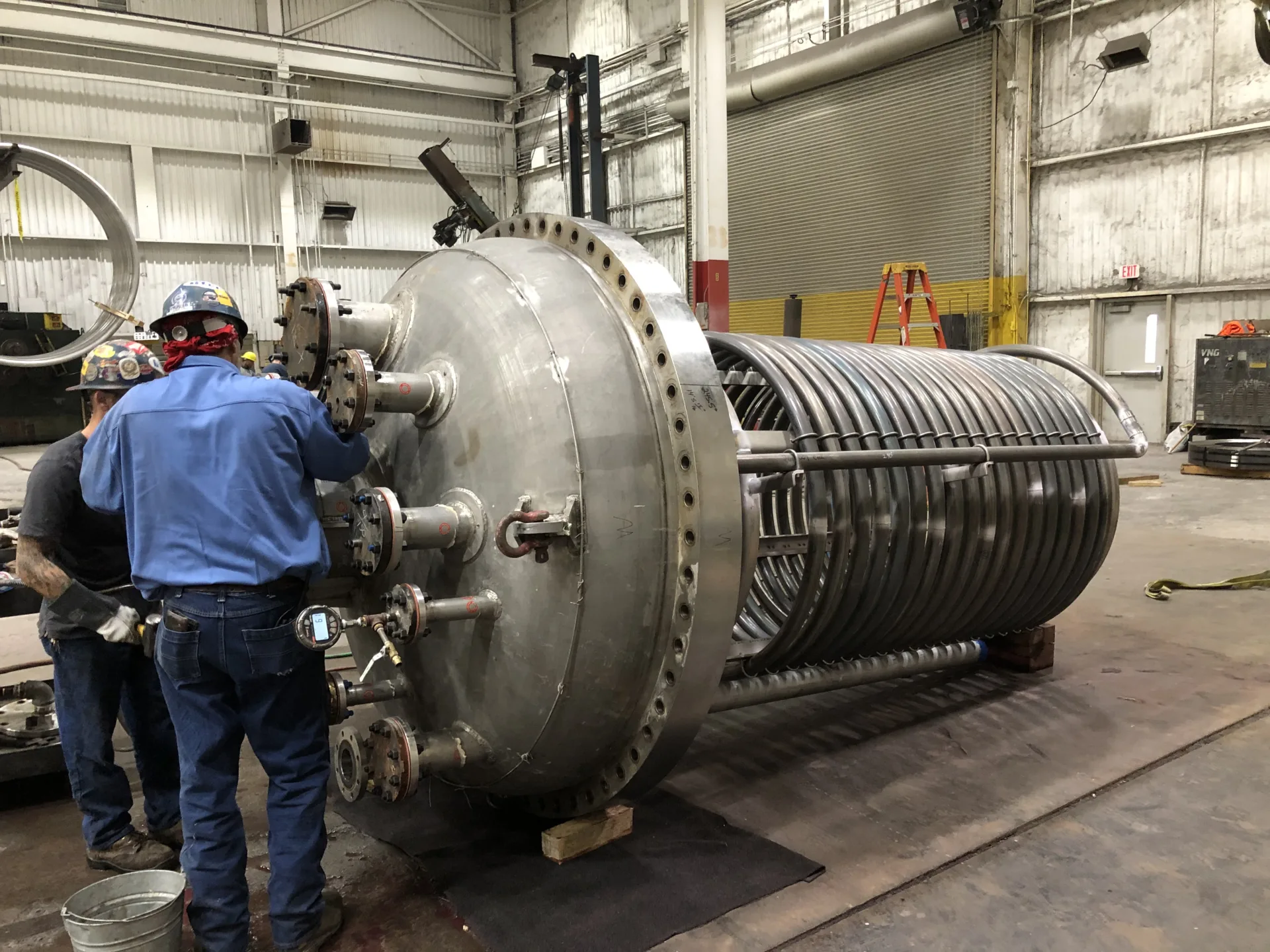 Reactor being rebuilt on a fabrication shop floor.